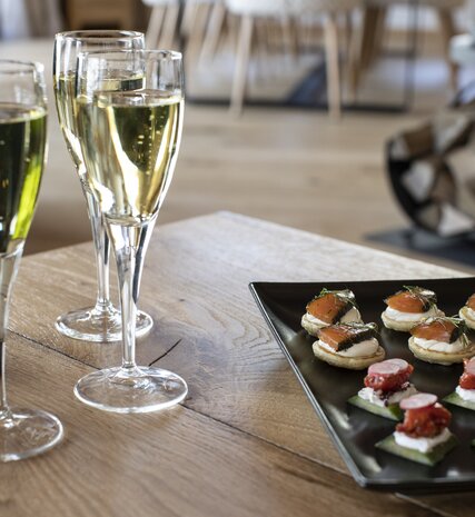 Champagne and canapes in chalet in Val d'Isere