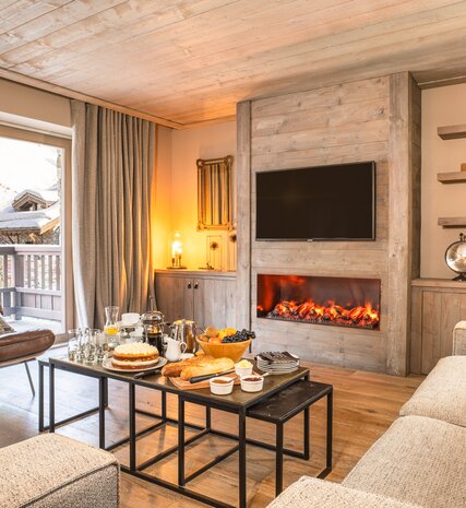 Afternoon tea laid out in contemporary Aspen House chalet in Val d'Isere