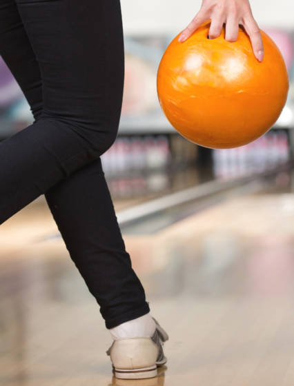 Woman ten pin bowling