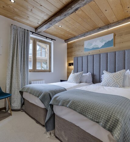 Twin beds in luxury chalet