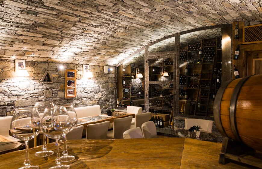 Stone-clad downstairs wine bar