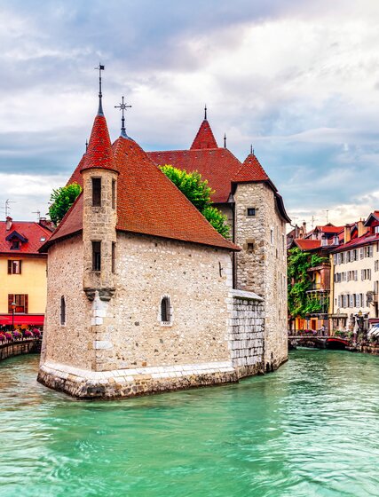 Canal and old stone building in the old part of Annecy 