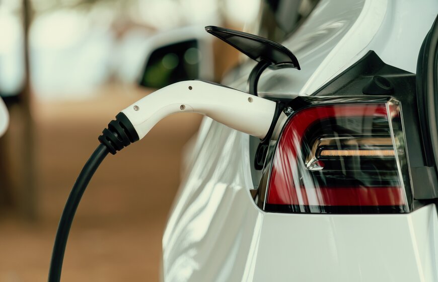 White EV charging using a white and black charger