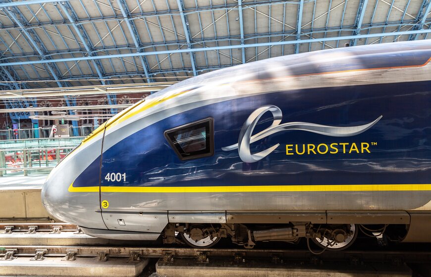 Blue, yellow and grey Eurostar train at the station