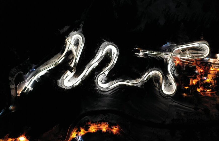 Aerial view of Olympic bobsleigh run in La Plagne by night