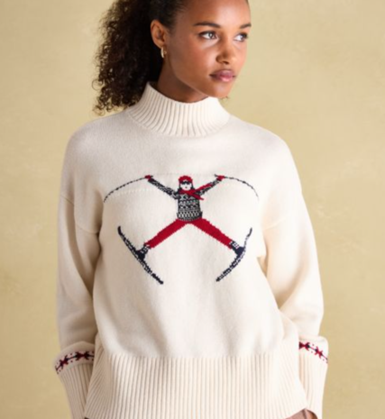 Cream jumper with red and black skier 