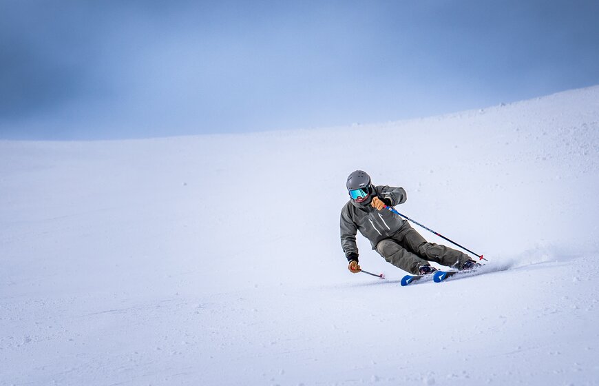 High-level ski instructor Mark Jones carving on the piste