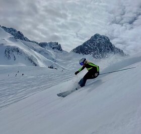 Chemmy Alcott skiing wearing Snow Finel base layer