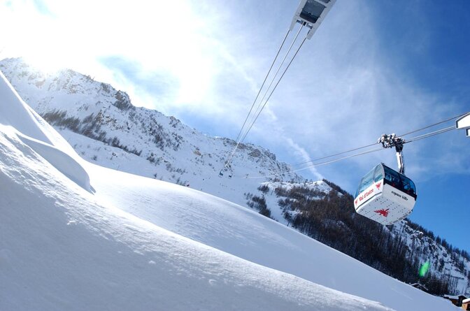 View from below of Olympique cable car in Val d'Isere