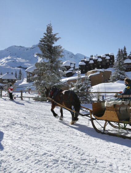 Horse drawn sleigh in Avoriaz on sunny day